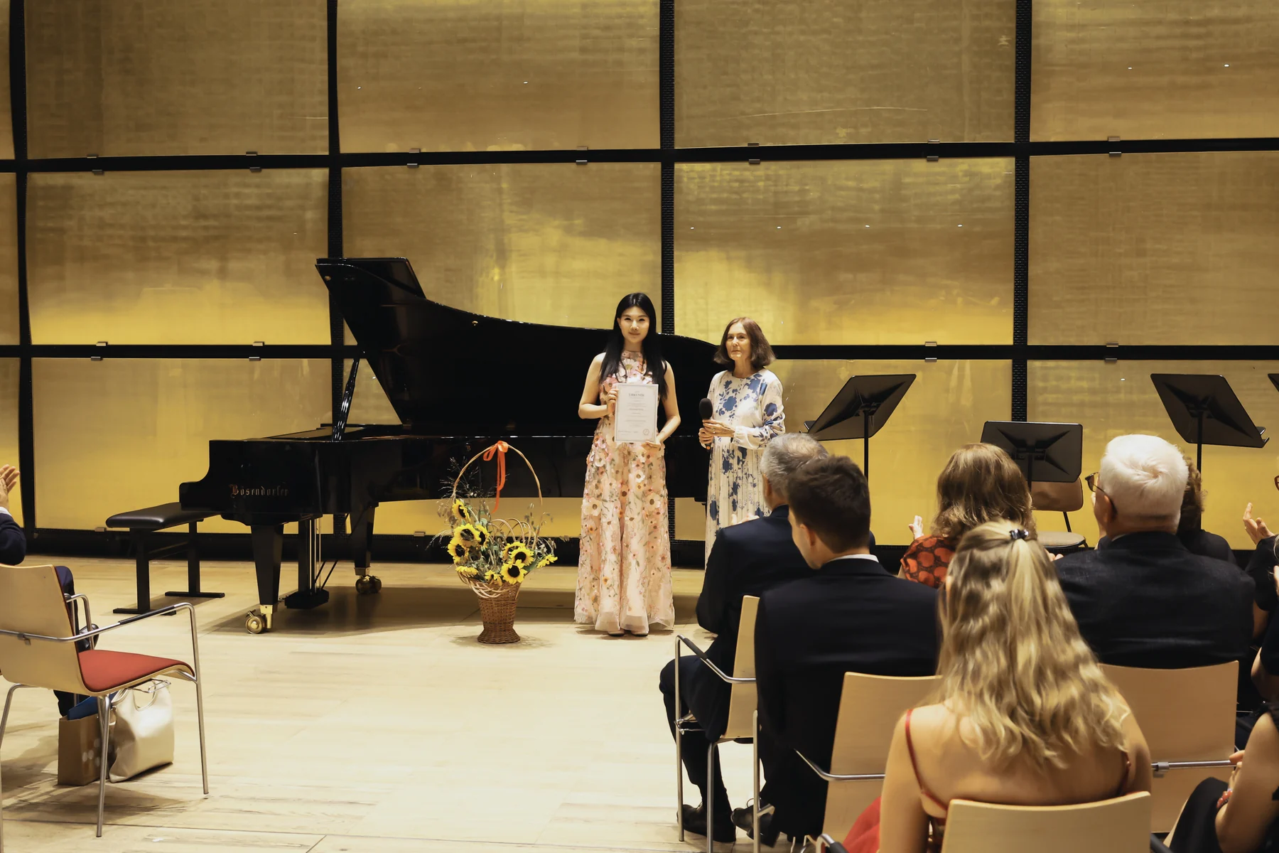 Following a certificate presentation at VIYAF Charity Art Night, Vienna, 16 August 2026.